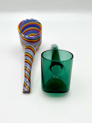close up of Puffco Proxy dry pipe attachment in rainbow linework and teal
