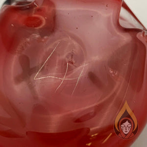 Close up on the signature of the artist which are the initials "LH"